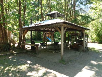 Camp Hideaway's  covered fire pit.